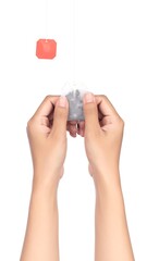 Fototapeta premium Person holding small gray object.