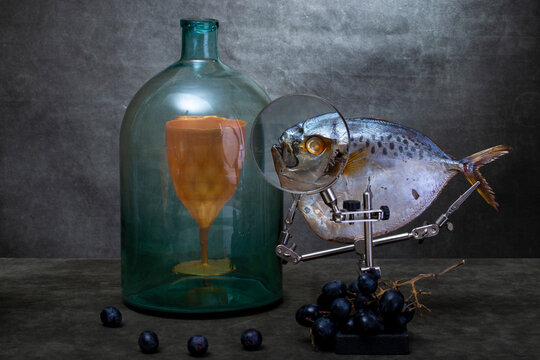 Abstract still life with a sunfish and a glass jar