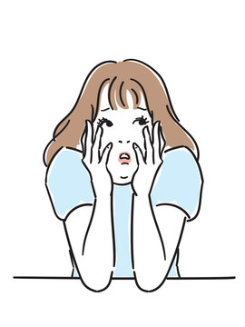 頬杖をつく可愛らしい女性