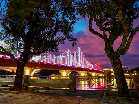 Bridge across the Tapi River in the evening twilight.