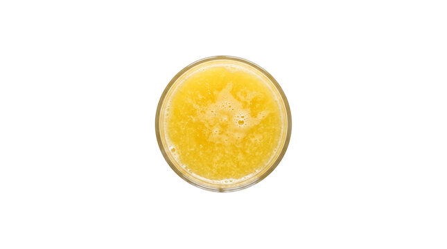 Orange juice in a glass overhead view.