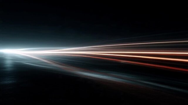 Dynamic streaks of vibrant light illuminate a dark conceptual background, creating a futuristic visual of high-speed motion, abstract energy, and digital data flow