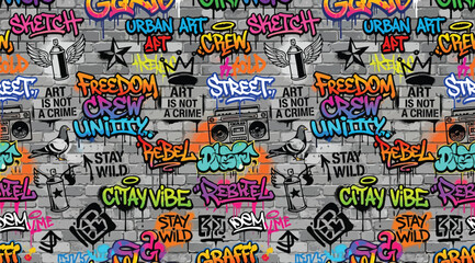 Seamless graffiti pattern with urban street art tags, boombox, pigeon, crown, and spray paint elements on brick wall background © S.Siam