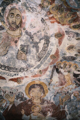 Naklejka premium Detailed view of the ancient and vibrant biblical frescoes decorating the rock-cut walls of the historic Sumela Monastery in Trabzon, Turkey