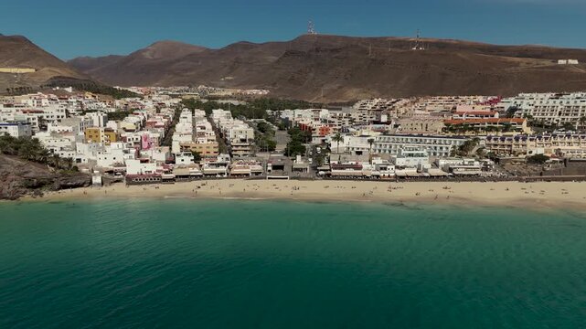 Aerial Pan of Morro Jable Beach and Turquoise Atlantic Ocean in Fuerteventura