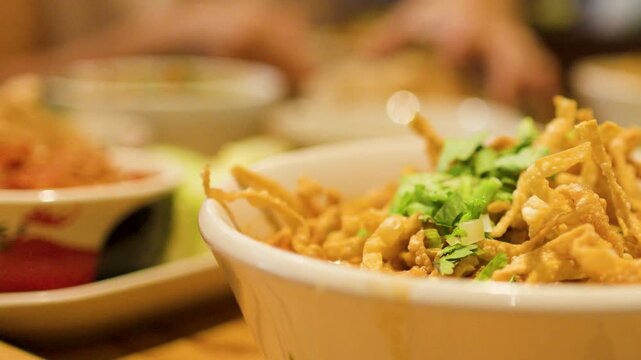Northern Thai Khao Soi Curry Noodle Soup in a Ceramic Bowl