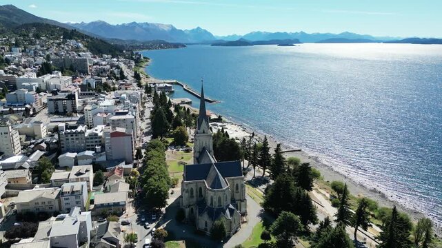 Aerial panoramic view of Bariloche waterfront with cathedral and Nahuel Huapi Lake in Patagonia Argentina