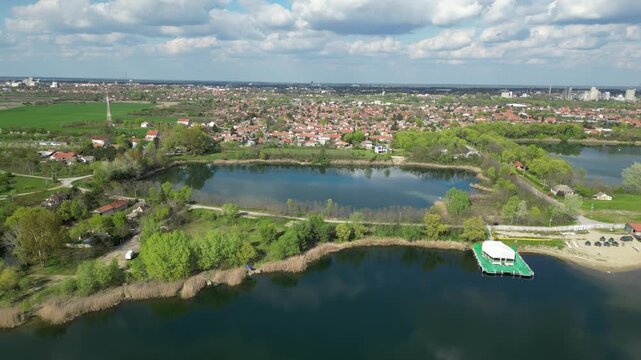 Zrenjanin peskara lake landscape with city skyline