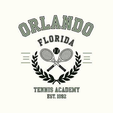 Orlando tennis academy since ninety two. Collegiate print design for t shirt. Crossed rackets with laurel wreath and ball. Retro athletic varsity typography graphic.