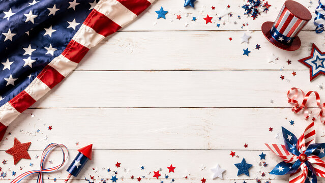 American Flag and Patriotic Decorations Arranged on White Wooden Background
