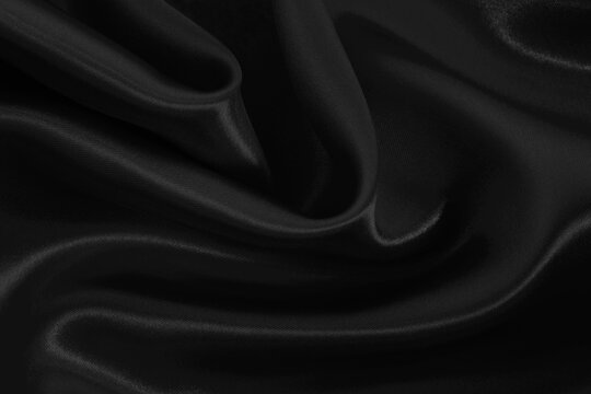 Black grey fabric texture background, detail of silk or linen pattern.