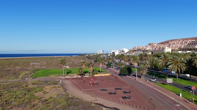Aerial view of luxury beachfront resort architecture, swimming pools and sun loungers in Morro Jable Fuerteventura