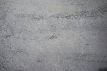 Fototapeta premium Grey background with green hints, metal texture