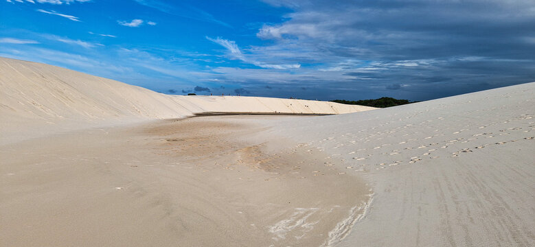 Dunes and lagoons of lagoa bonita, Lencois Maranhenses, Barreirinhas, Brazil. White sand dunes with pools of fresh water
