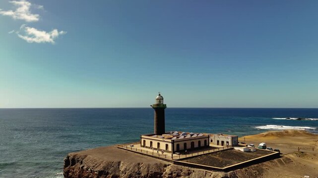 Faro Punta de Jandia Lighthouse Aerial Orbit on Rocky Coast of Fuerteventura Spain