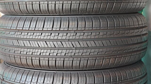 The tires are stacked in layers.