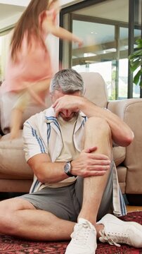 Frustrated, dad or stress with kids running in home for chaos, adhd or burnout in timelapse. Tired, father or person with depression or motion blur for hyperactive children or overwhelmed in house