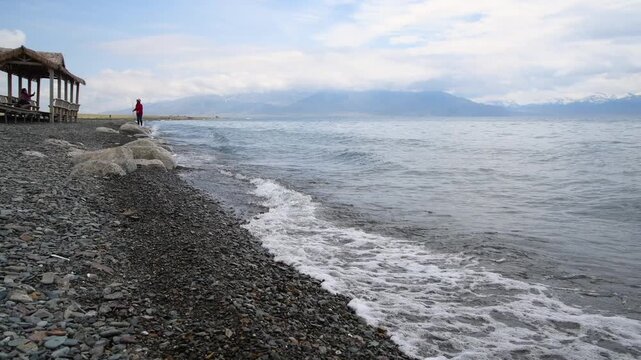 Waves lapping shore of Sayram Lake, Bole, Xinjiang China