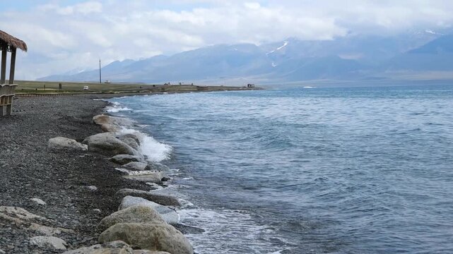Waves lapping shore of Sayram Lake, Bole, Xinjiang China