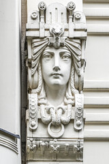 Fototapeta premium sculpture on the facade in Riga Latvia