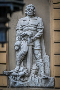 statue of a man in old riga