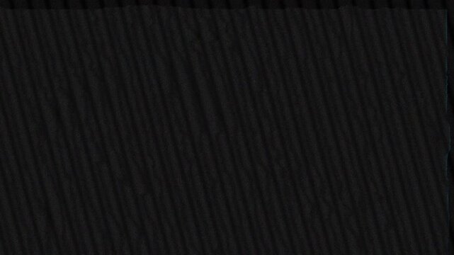 Corrupted VHS tape signal with rotation artifact noise and retro glitch 