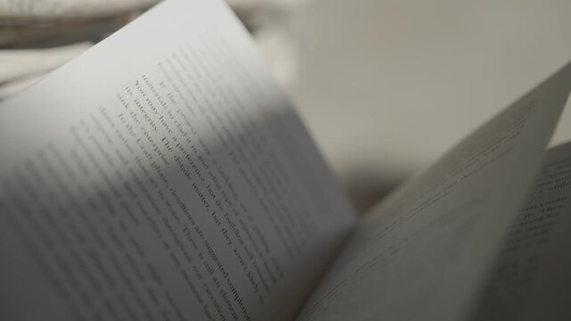 book flickering in the breeze