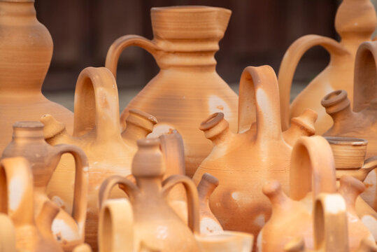 Traditional clay pitchers in a group The Concept of craftsmanship and tradition