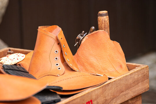 Pieces of brown leather for shoemaking The Concept of craftsmanship and quality
