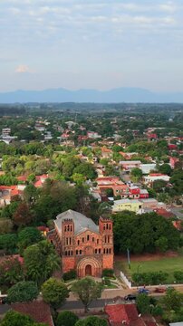 Vertical aerial of Our Lady of Asuncion historic church facade in Villarrica, Paraguay