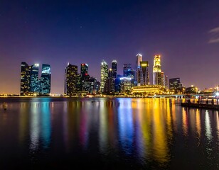 Fototapeta premium A serene cityscape at dusk with skyscrapers reflecting off the water