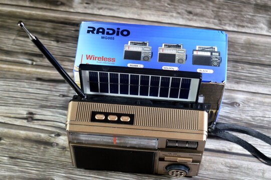 Cairo, Egypt, May 15 2026: a portable solar-powered AM, FM and SW radio with Bluetooth connectivity and MP3 playback capabilities, with a vintage retro style appearance