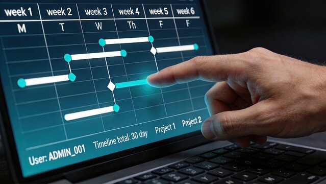 Project timeline gantt chart displayed on computer screen with hand pointing at schedule, illustrating weeks planning and progress tracking for admin management workflow