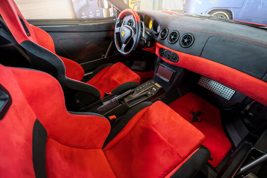 Brno, Czech Republic - May 14, 2026: Interior of a classic Ferrari 360 Challenge Stradale sports car. Red and black seats.