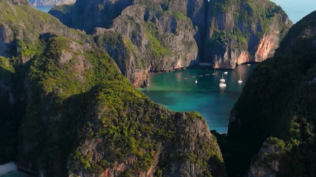 Breathtaking aerial view of Maya Bay in Koh phi phi Island, Thailand, Tropical Beach Cove With Coastal Cliffs. 