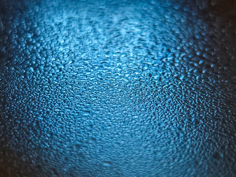 Macro Texture of Water Condensation Droplets on Dark Blue Surface