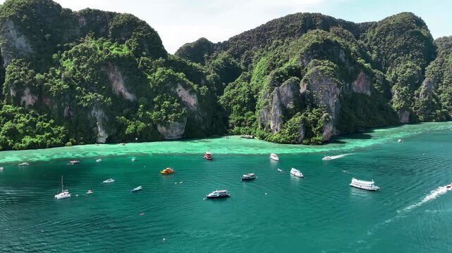 Stunning Aerial view of the beautiful Maya Bay, Phi Phi Islands, Thailand. dramatic and tropical paradise destination. 