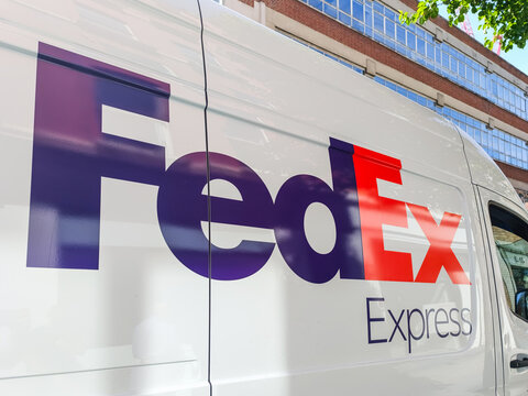 FedEx Express logo on the side of a white delivery van. London, UK, 8 May 2024