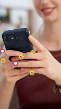 Text, emojis and hands with phone, online communication and post reaction with social media icons. Typing, virtual expression and woman with tech, digital symbols or chatting on messaging platform.