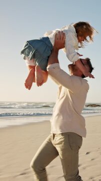 Father, girl and jump with spin at beach with smile, excited and play for bonding on summer vacation. People, children and outdoor with connection, happy or ocean with fun games on seaside holiday