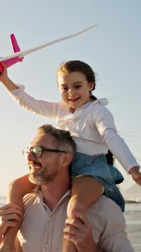 Father, plane and girl on shoulder at beach with family, fun and bonding on vacation in summer. People, children and parents with connection, happy and flight with toy on walk for seaside travel