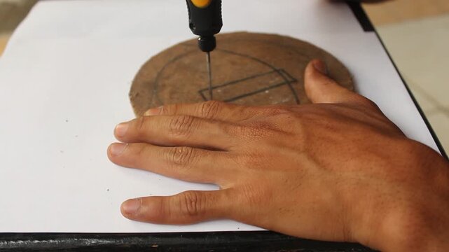 Close Up Footage of Hands Drilling Wood Board with Electric Screwdriver for DIY Project