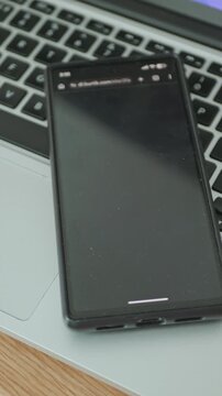 Man passing security check on smartphone to get access granted to encrypted data