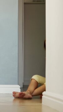 Walking, legs and father with child in home, separation anxiety or dependence for attachment comfort. Clingy behavior, dragging or man with happy girl for support, emotional connection or attention