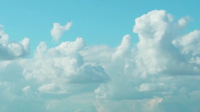 Cumulus Plump White Clouds in a Blue Sky in the Afternoon in Sunny Cloudy Good Weather. Pure Nitrogen Layer. Background of Sky and Clouds.