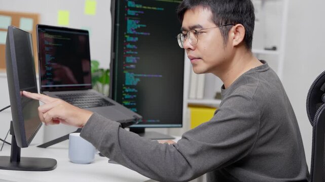 Tech enthusiast coding at home modern workspace digital content indoor side view focused innovation