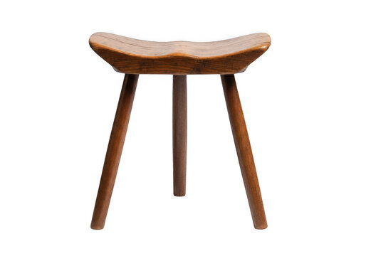 Rustic wooden three legged stool with a curved seat design isolated transparent png.