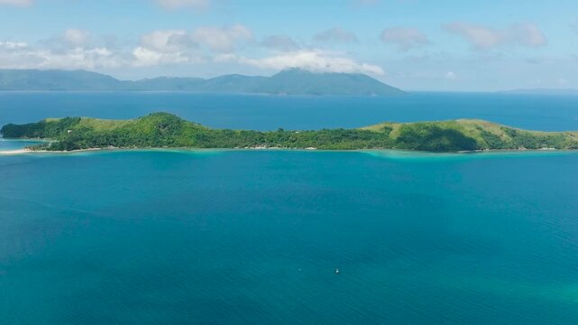 Aerial view of Logbon Island with blue sea. Romblon, Philippines.