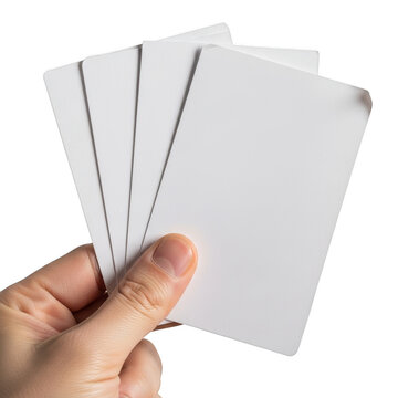 Hand holding four blank white playing cards isolated on a transparent background