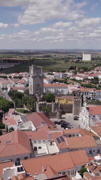 Vertical aerial view of Beja cityscape with Beja Castle in Portugal.